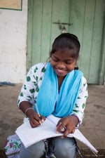 ethical tea partnership girl writing